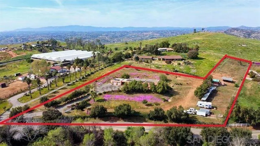 6960 West Lilac Road Bonsall, CA 92003 - Photo 5 of 37 an aerial view of a city
