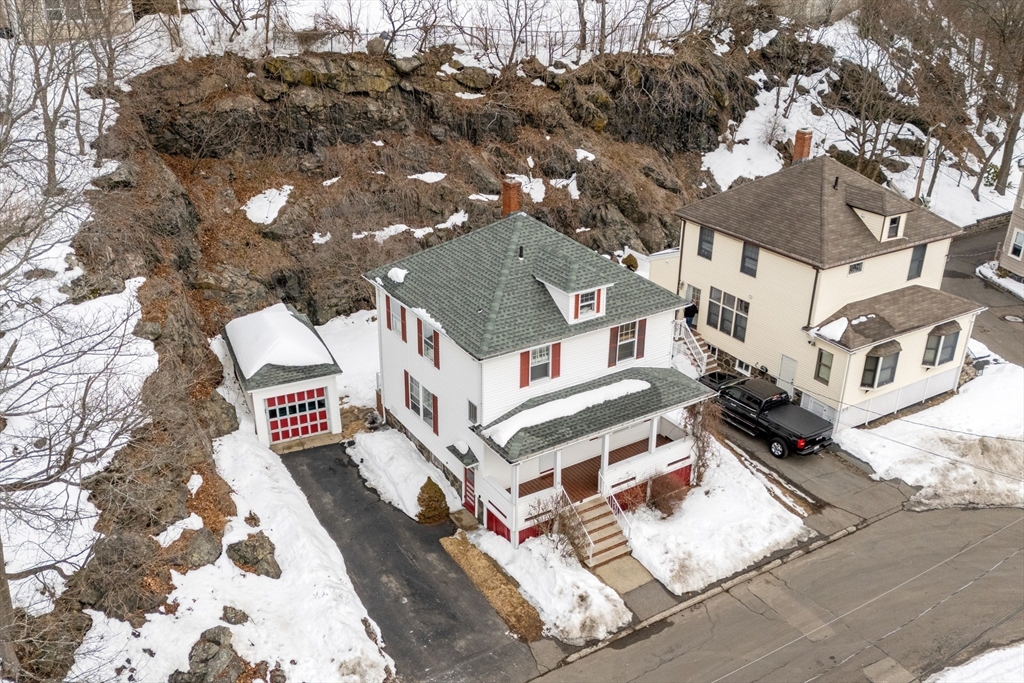 a white building with a clock on the top