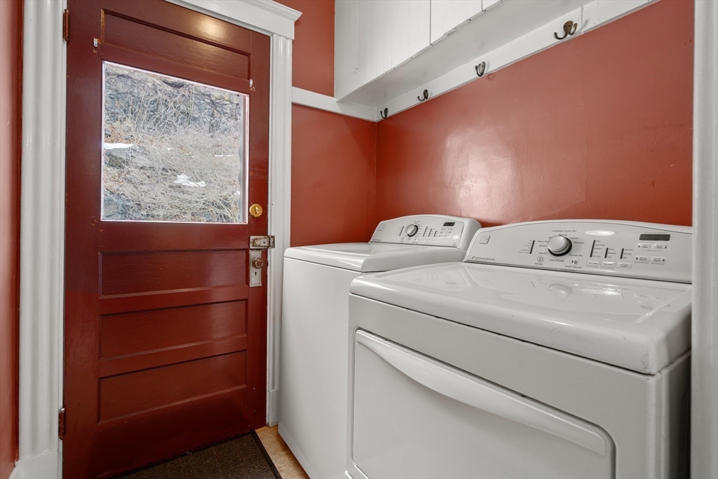 16 Isabella Street Lynn, MA 01902 - Photo 11 of 26 a utility room with dryer and washer