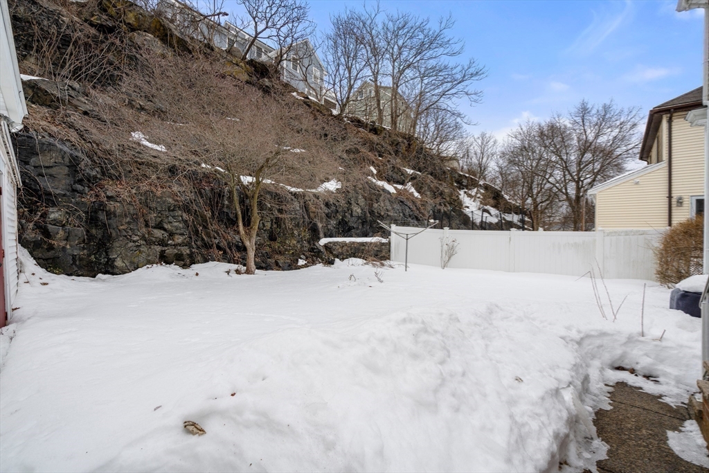 16 Isabella Street Lynn, MA 01902 - Photo 12 of 26 a view of a covered in snow