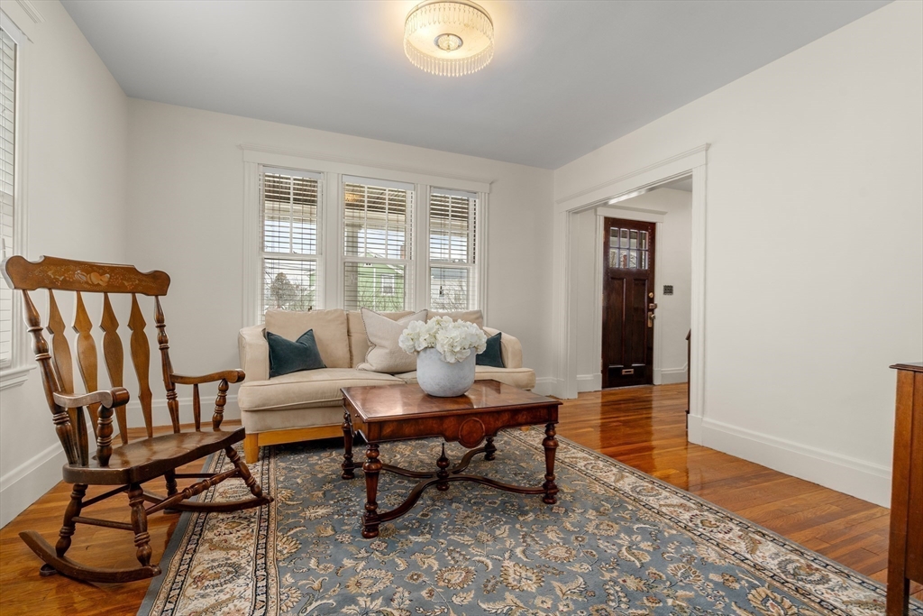 16 Isabella Street Lynn, MA 01902 - Photo 5 of 26 a dining room with furniture and wooden floor