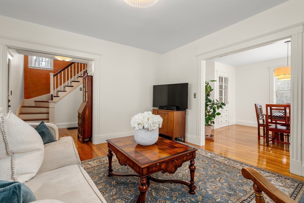 16 Isabella Street Lynn, MA 01902 - Photo 6 of 26 a living room with furniture and a flat screen tv
