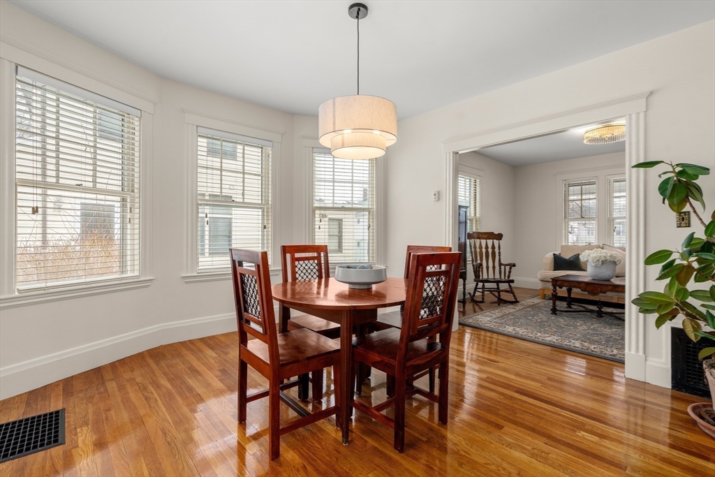 16 Isabella Street Lynn, MA 01902 - Photo 7 of 26 a dining room with furniture window wooden floor