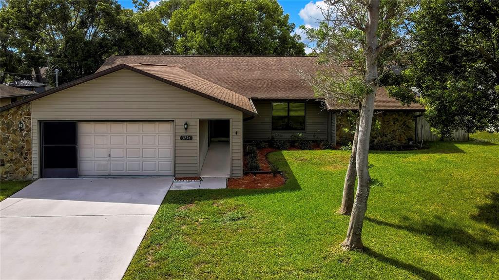 3296 Dolin Avenue Spring Hill, FL 34606 - Photo 1 of 54