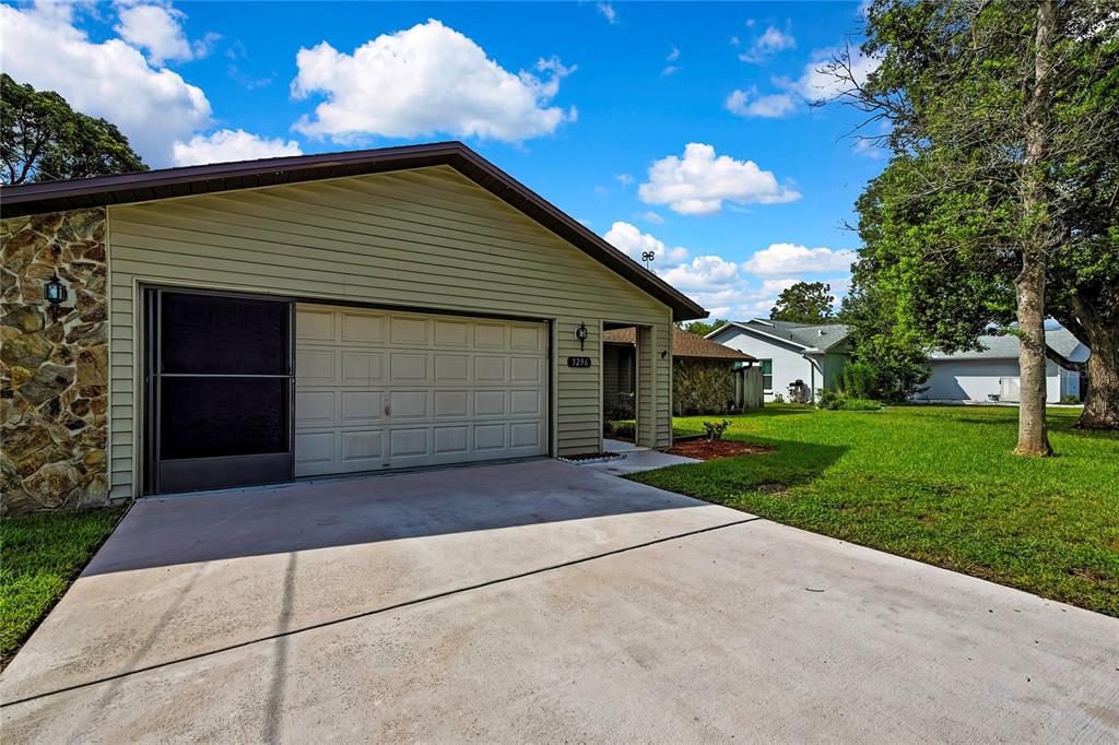 3296 Dolin Avenue Spring Hill, FL 34606 - Photo 3 of 54