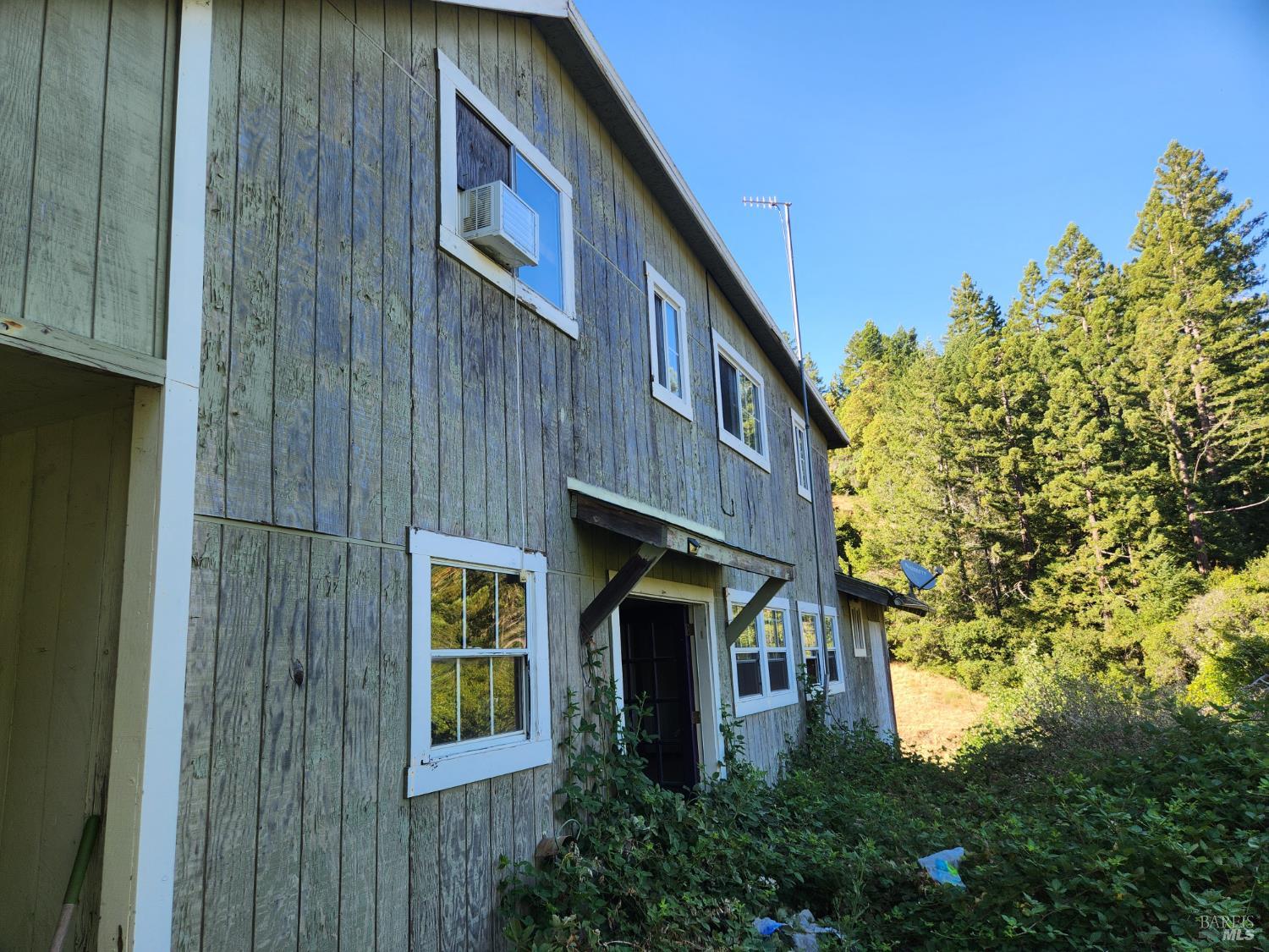 13333 Low Gap Road Ukiah, CA 95482 - Photo 14 of 50 a front view of a house with a yard