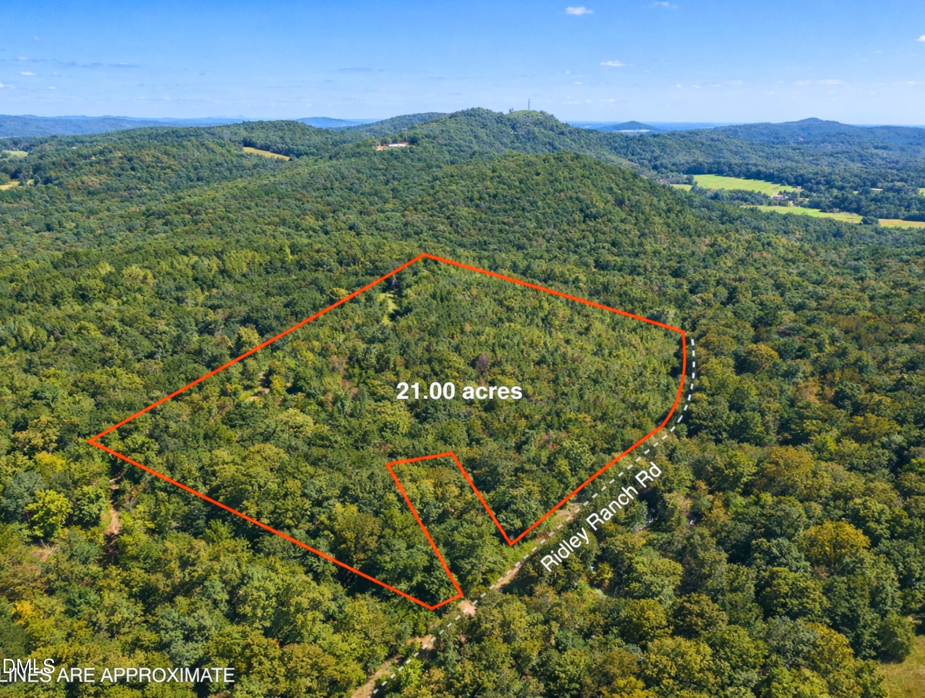 00 Ridley Ranch Road Hiddenite, NC 28636 - Photo 12 of 21 a view of a lush green field with an ocean view