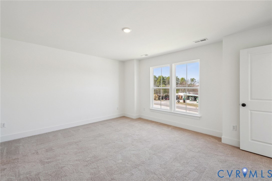 12002 Afternoon Path Henrico, VA 23233 - Photo 14 of 34 an empty room with windows