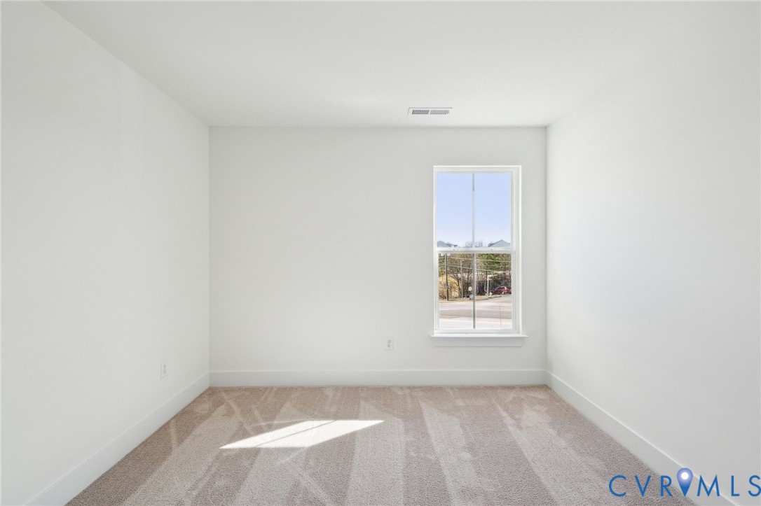 12002 Afternoon Path Henrico, VA 23233 - Photo 20 of 34 a view of an empty room with a window