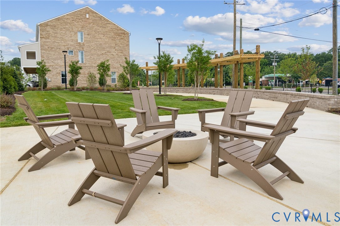 12002 Afternoon Path Henrico, VA 23233 - Photo 32 of 34 a view of a patio with a table and chairs