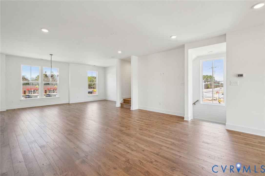 12002 Afternoon Path Henrico, VA 23233 - Photo 9 of 34 a view of an empty room with window and wooden floor