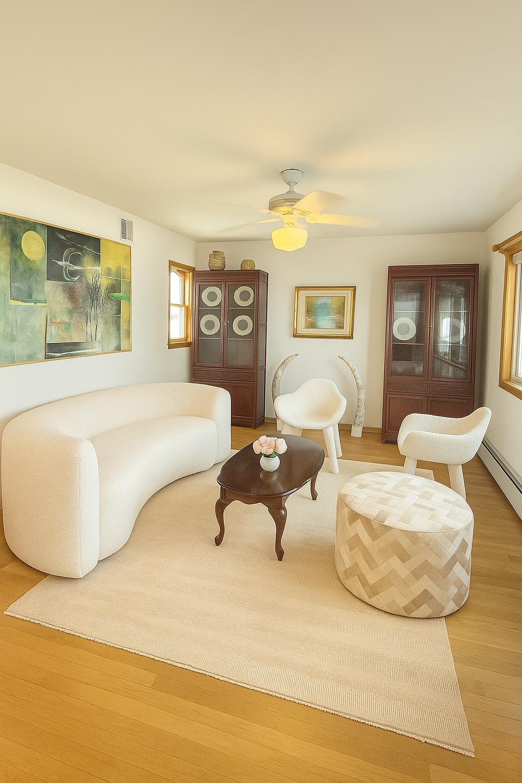 77 Hampton Place Freeport, NY 11520 - Photo 3 of 21 a bedroom with a bed and wooden floor