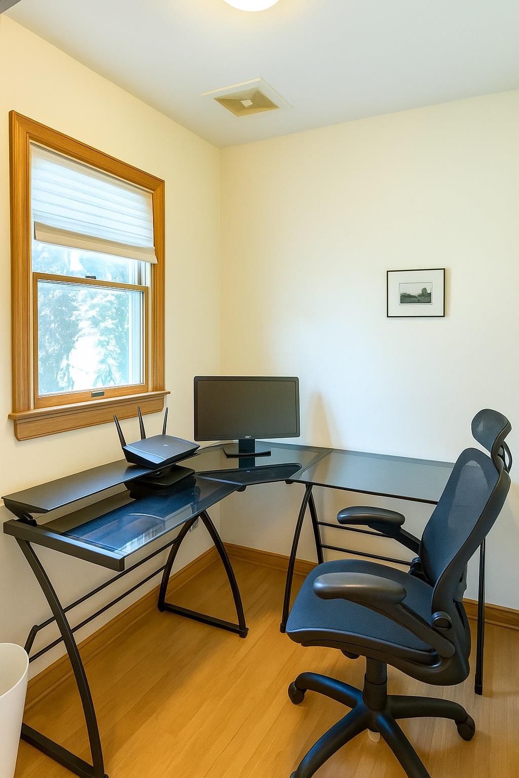 77 Hampton Place Freeport, NY 11520 - Photo 8 of 21 a view of a workspace with furniture and a window
