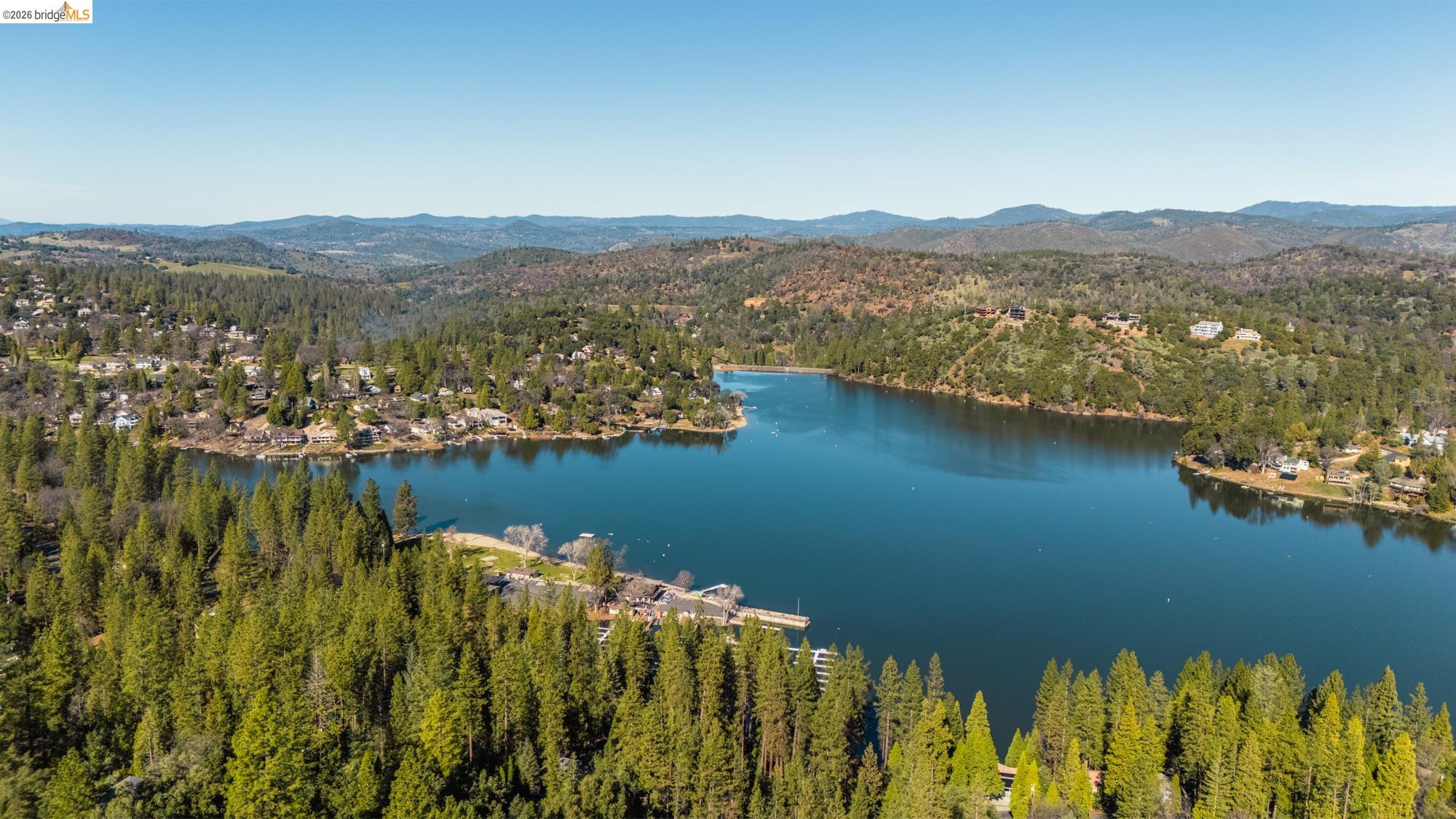 19369 Ferretti Road Groveland, CA 95321 - Photo 43 of 45 Aerial overview of property's location featuring a heavily wooded area and a water and mountain view