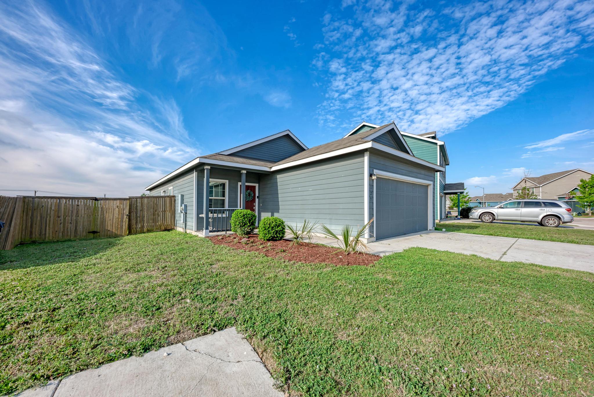 129 Vulcan Drive Jarrell, TX 76537 - Photo 2 of 35 a view of a house with a yard