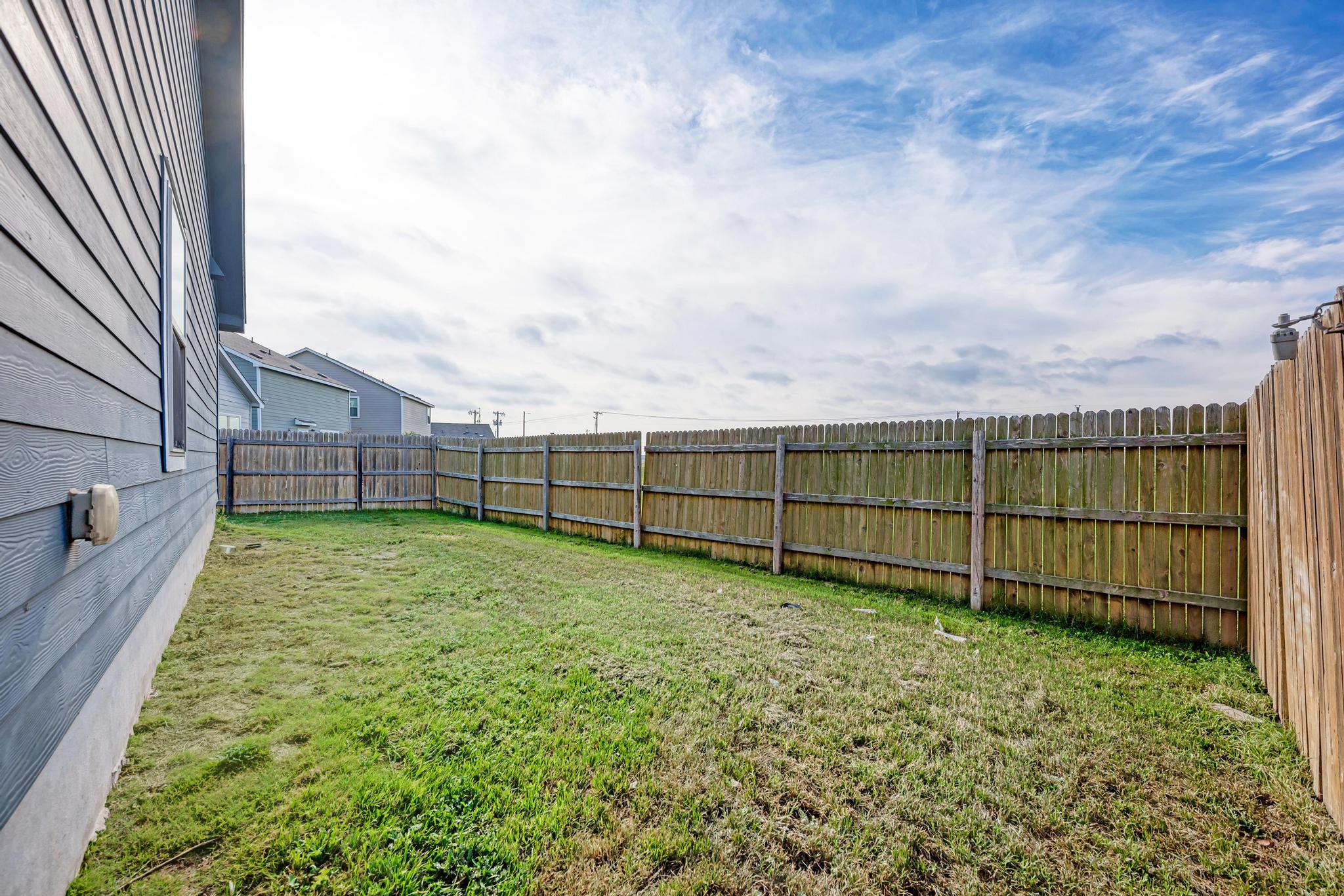 129 Vulcan Drive Jarrell, TX 76537 - Photo 31 of 35 a view of a backyard