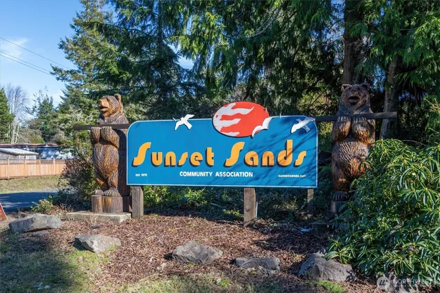 a sign on the side of the road