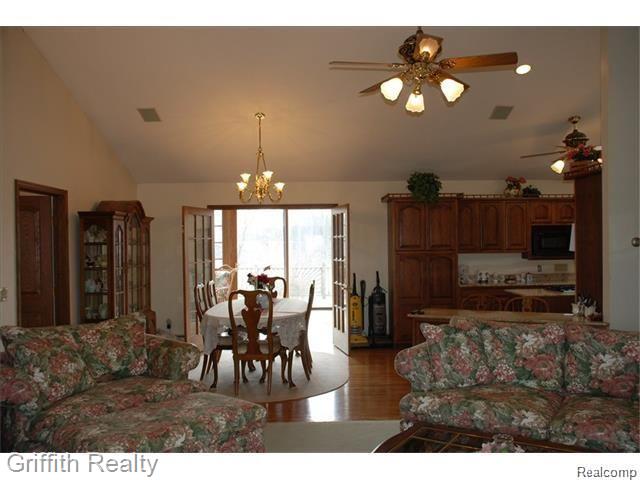 20563 Wasson Road Pinckney, MI 48169 - Photo 13 of 44 WassonLvRmthruKitchentoFmRm.jpg