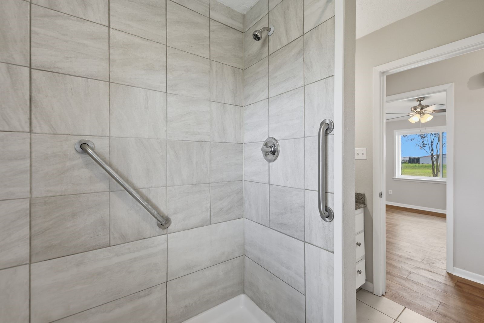 3249 Newsom Road Bellville, TX 77418 - Photo 14 of 20 a bathroom with a shower