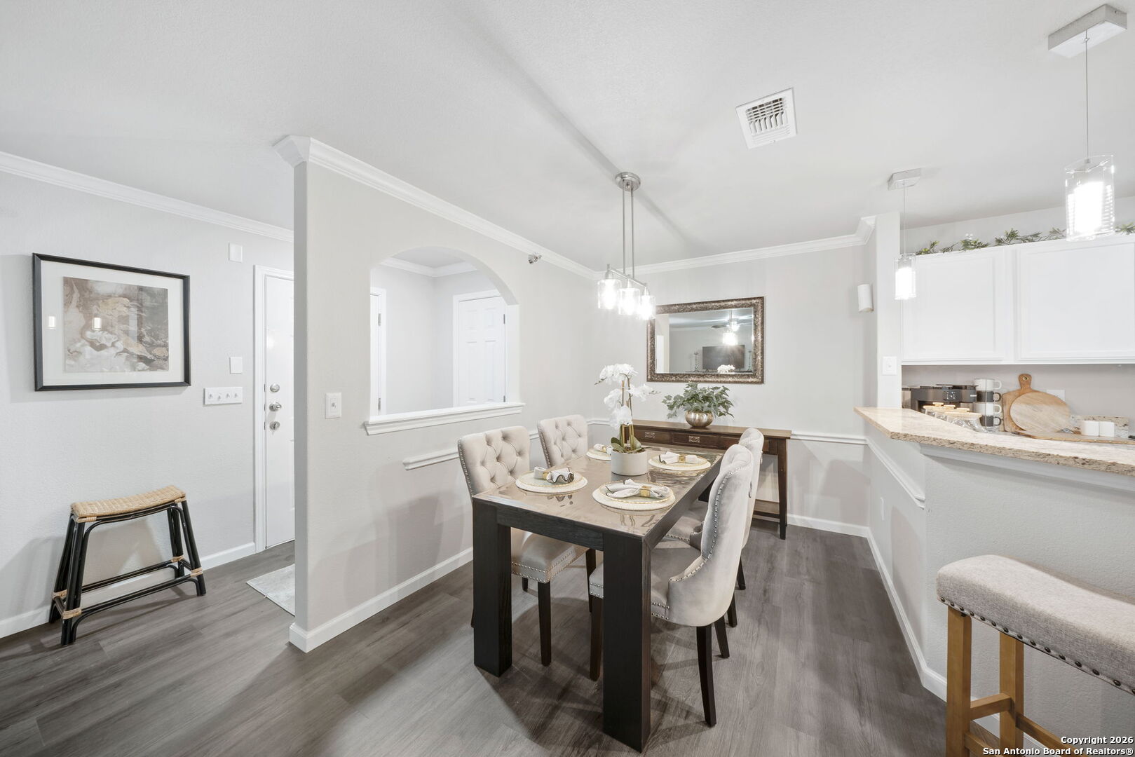 7323 Snowden Road, Unit 2201 San Antonio, TX 78229 - Photo 15 of 27 a view of a kitchen area with furniture and wooden floor