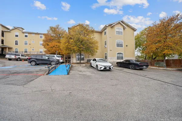 a car parked in front of a building