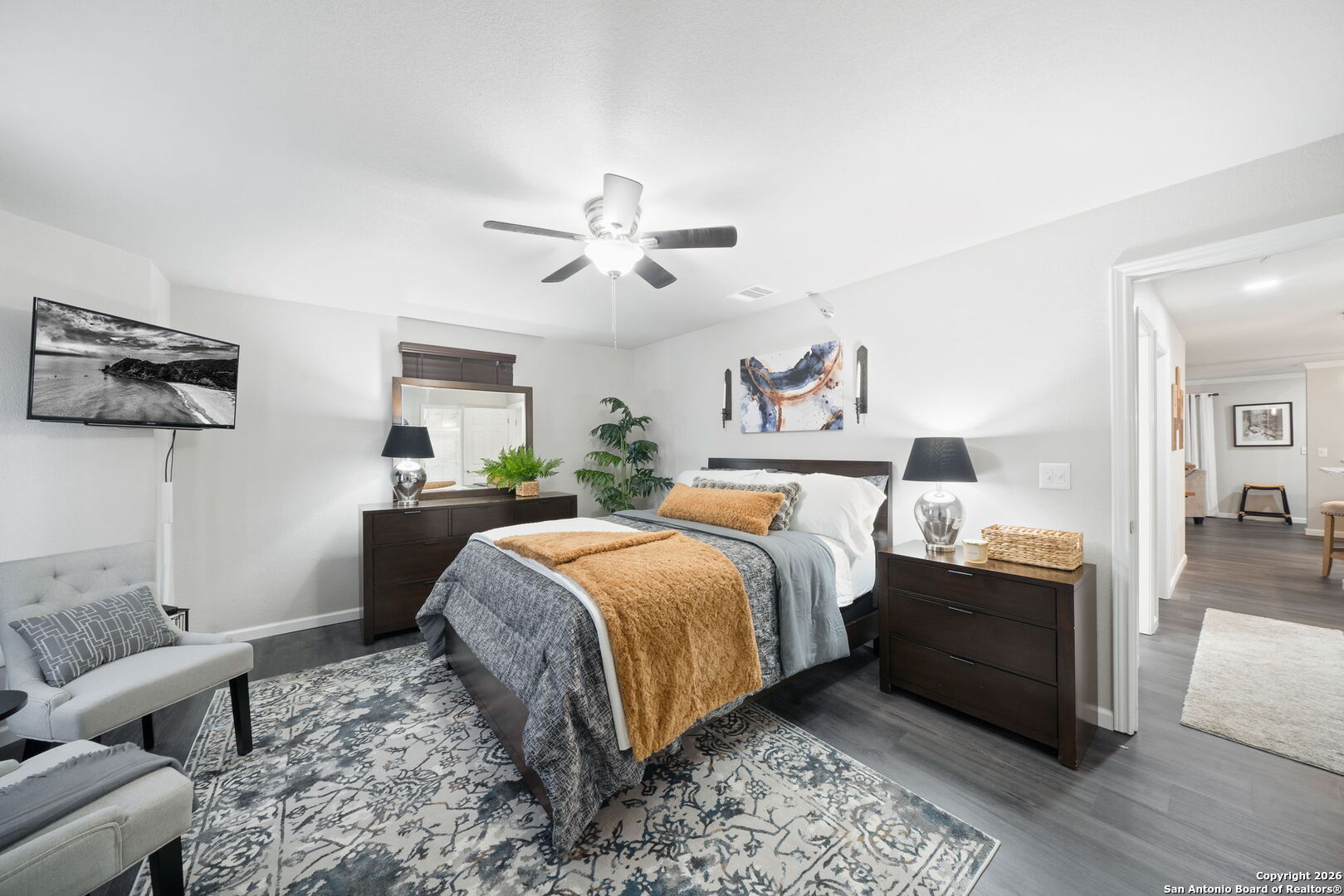 7323 Snowden Road, Unit 2201 San Antonio, TX 78229 - Photo 25 of 27 a bed room with a bed and a couch