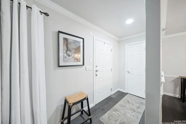 a view of a hallway with workspace