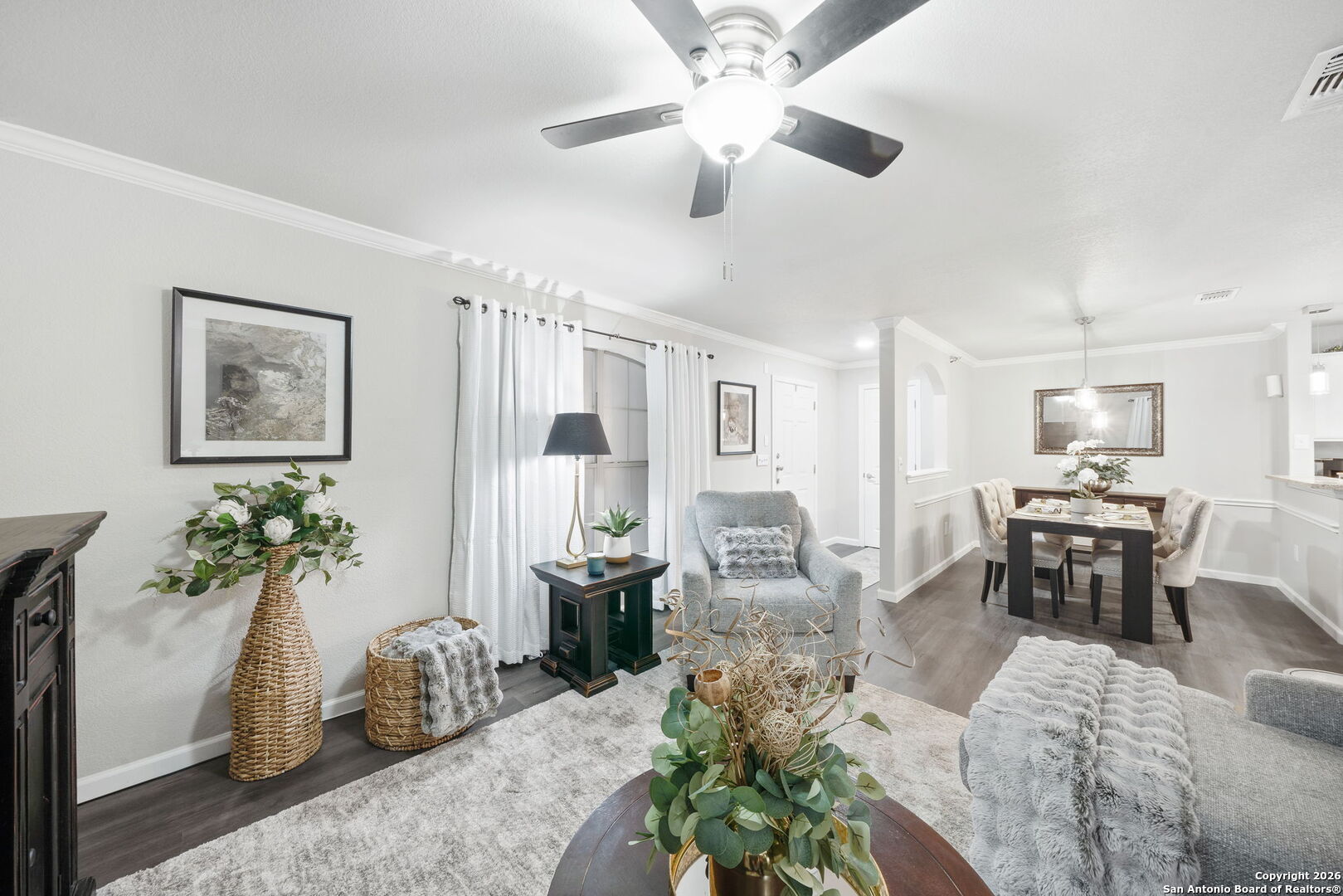7323 Snowden Road, Unit 2201 San Antonio, TX 78229 - Photo 8 of 27 a living room with furniture potted plant and a chandelier