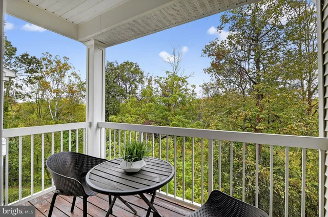 a view of a chair in wooden deck