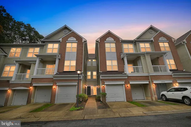 a car parked in front of a house