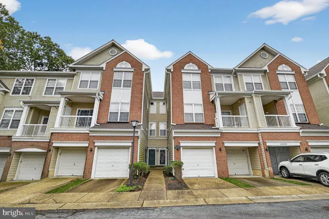a front view of residential houses