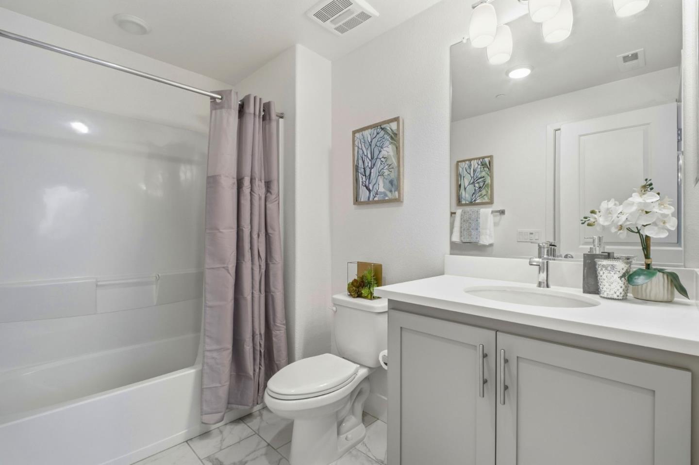 385 Line Street Hayward, CA 94544 - Photo 23 of 38 a bathroom with a sink toilet and shower