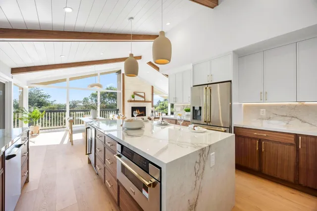 a bathroom with a toilet a sink and a mirror