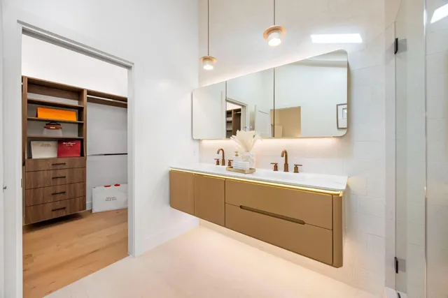 a view of a hallway with washer and dryer
