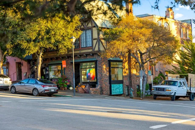 a view of balcony with wooden floor and fence
