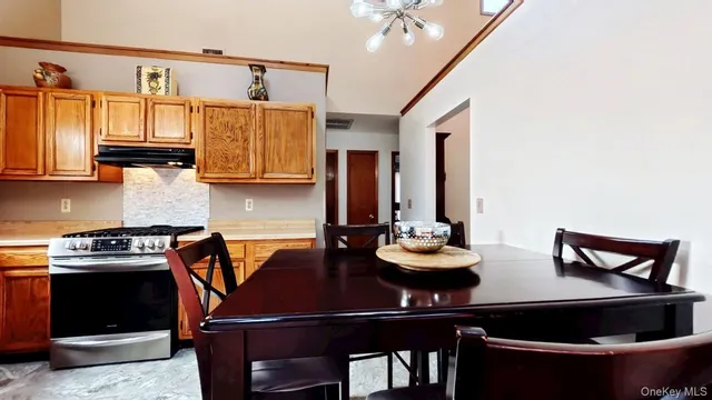 a kitchen with sink and stove