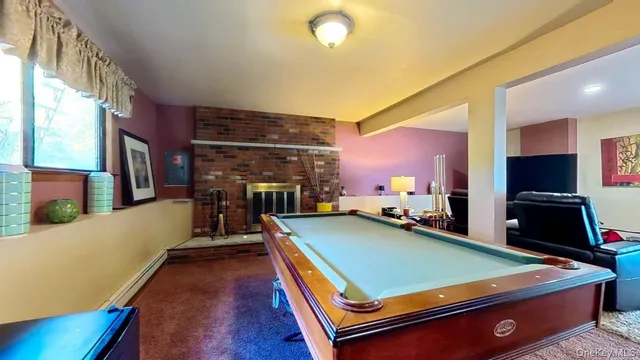 a room with furniture and flat screen tv