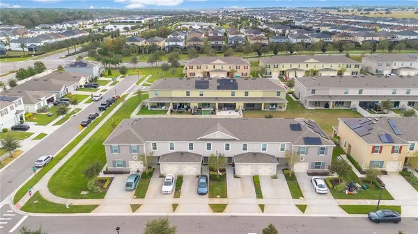 a view of city with ocean