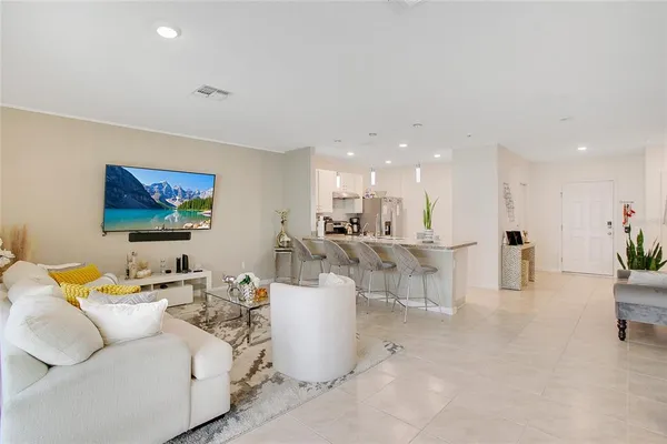 a living room with furniture and a table