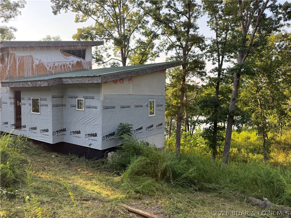 195 Jumping Bass Cove Road Roach, MO 65787 - Photo 20 of 37 Side view of house