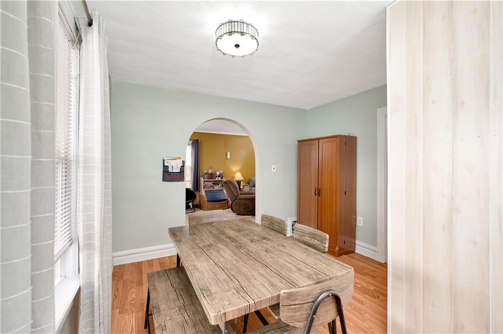 821 Vogan Street New Castle, PA 16101 - Photo 11 of 33 a view of a dining room with furniture and a chandelier