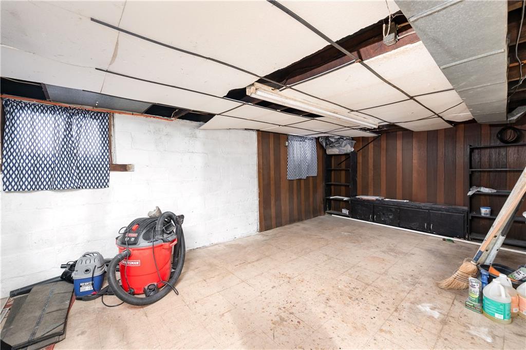 821 Vogan Street New Castle, PA 16101 - Photo 26 of 33 a view of a room with wooden walls