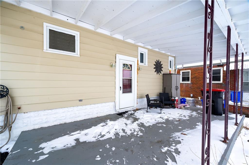 821 Vogan Street New Castle, PA 16101 - Photo 31 of 33 a view of a house with a patio