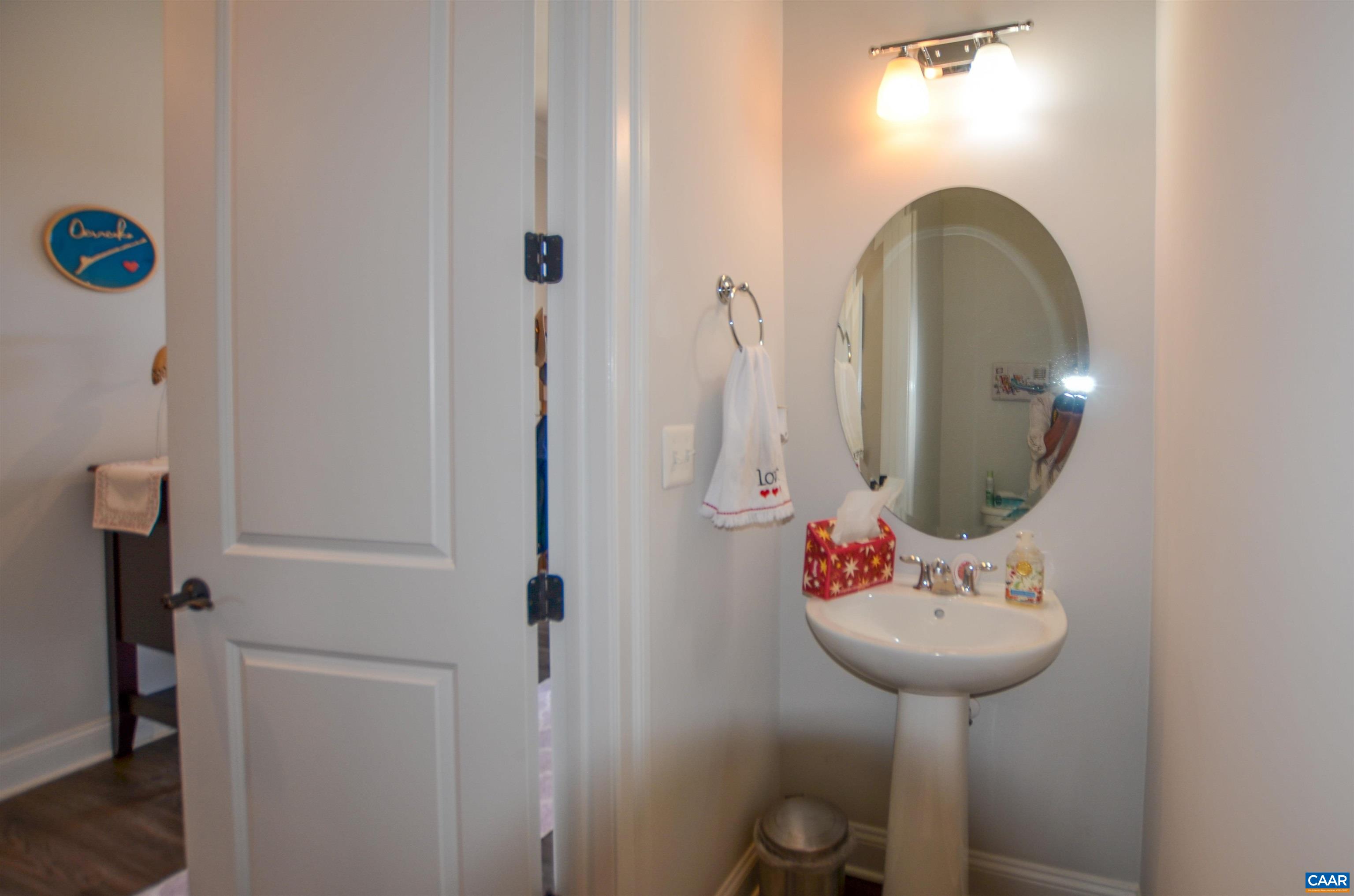327 Claibourne Road Crozet, VA 22932 - Photo 8 of 36 a bathroom with a sink and a mirror