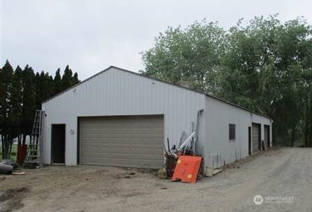 2311 Highland Drive Bridgeport, WA 98813 - Photo 16 of 19 a blue and white house with a outdoor space