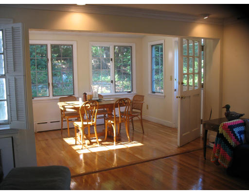 48 Nickerson Road Newton, MA 02467 - Photo 4 of 15 a view of a dining room with furniture window and outside view