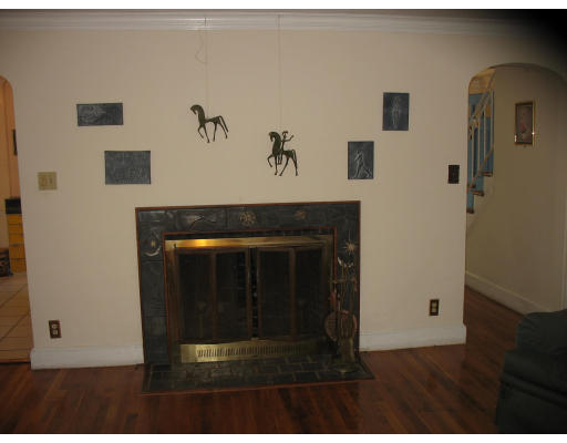 48 Nickerson Road Newton, MA 02467 - Photo 6 of 15 a living room with a fireplace
