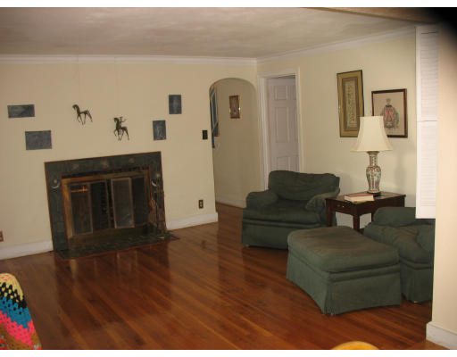 48 Nickerson Road Newton, MA 02467 - Photo 7 of 15 a living room with furniture and a fireplace