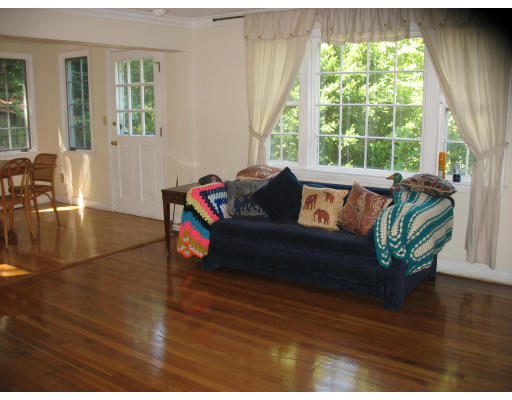 48 Nickerson Road Newton, MA 02467 - Photo 8 of 15 a living room with furniture and a wooden floor