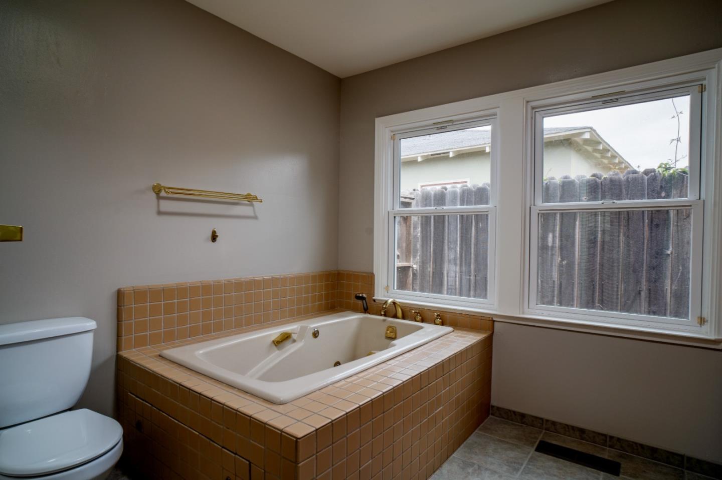 351 Lorimer Street Salinas, CA 93901 - Photo 16 of 37 a bathroom with a sink and a toilet
